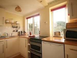 The modern kitchen of Tamarisk Apartment.