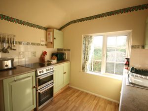 The kitchen in Trevose View apartment, at Garden Cottage Flats.